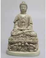 Buddha-rød-i meditationsstilling.
